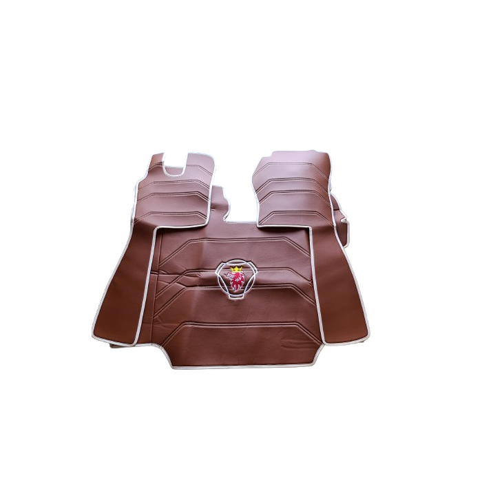 WhatsApp_Image_2025-10-02_at_17.02.03__1_-removebg-preview Tapete automóvel castanho com emblema central.